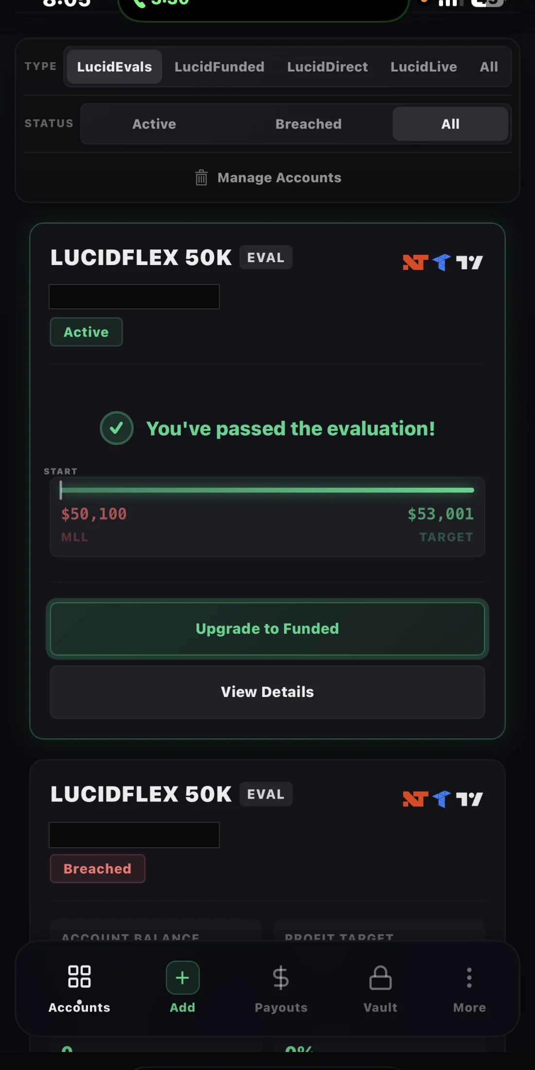 An account list from the same firm. The top account reads: you have passed the evaluation. A second account below it is marked breached. Both account numbers are covered by black blocks.